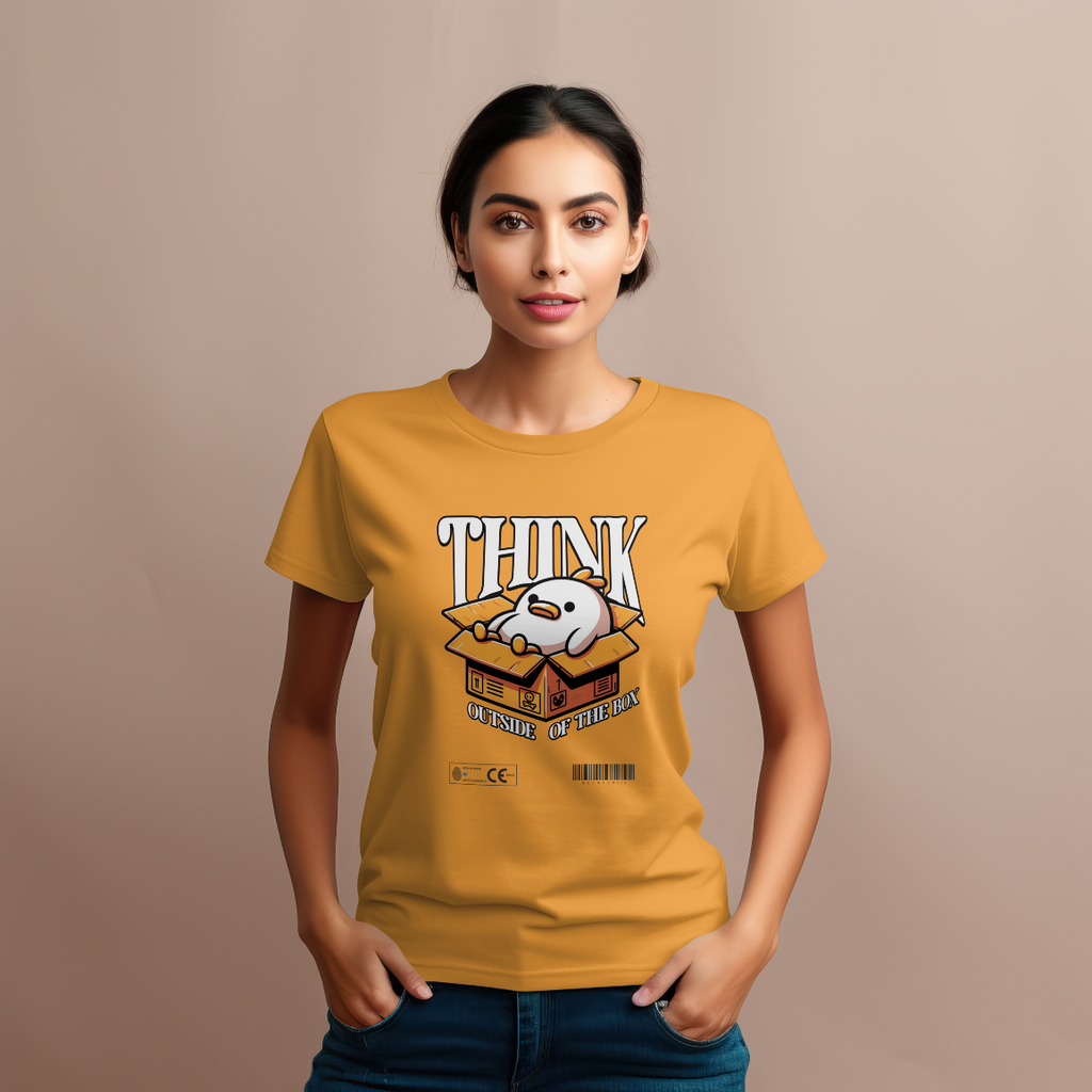 Woman wearing a mustard yellow t-shirt with a thinking duck graphic design on a beige background