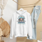 White hoodie with a graphic design of a sleeping bulldog on a hanger against a neutral background