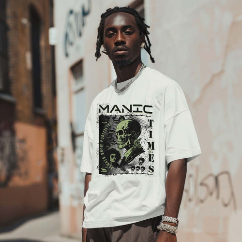 Person wearing a white t-shirt with a graphic design and text, standing in an urban setting.