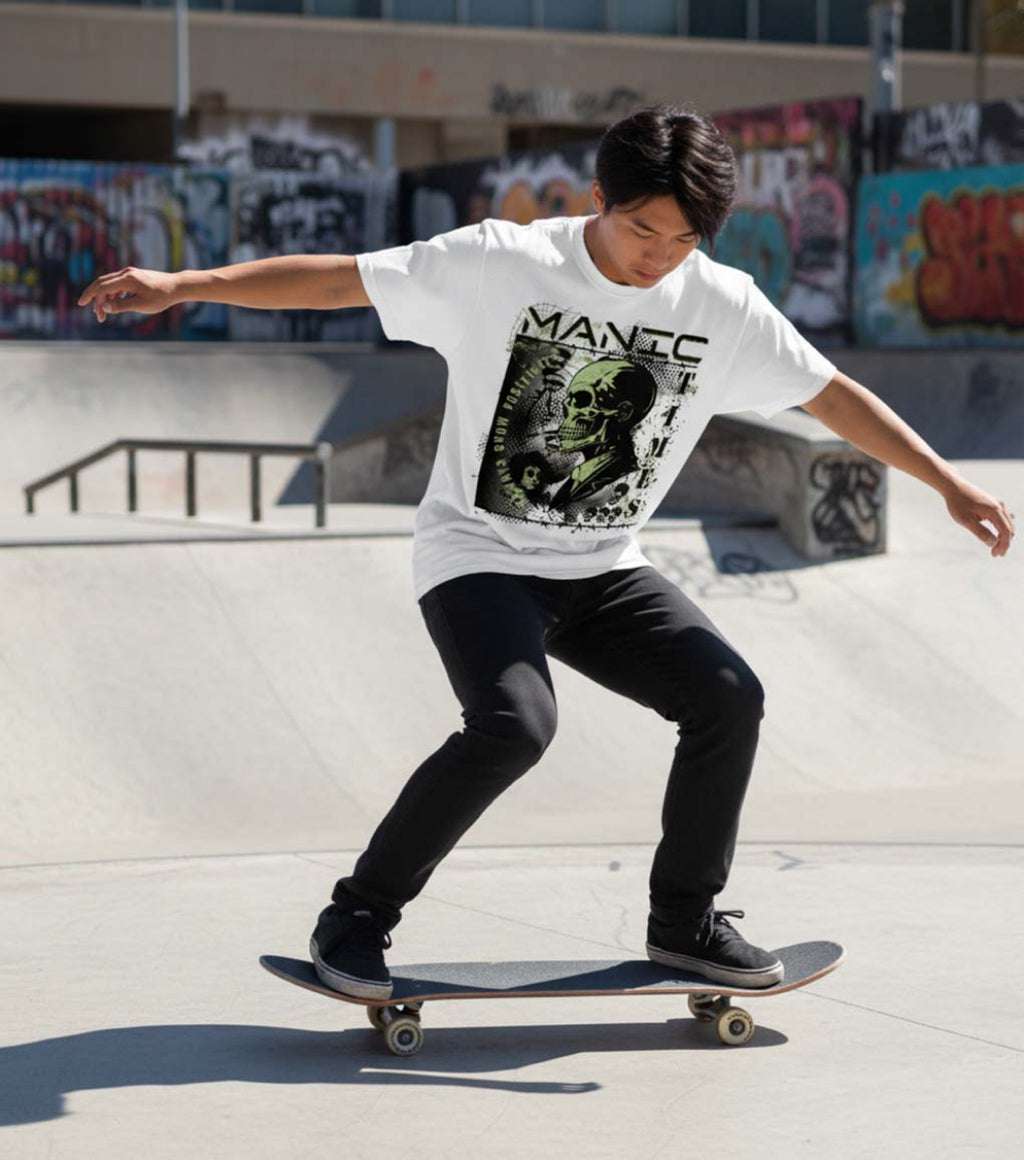 Skateboarder performing a trick at a skate park with graffiti in the background