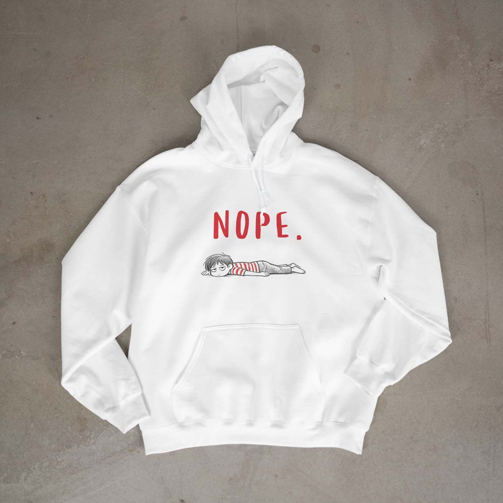 White hoodie with 'NOPE.' text and graphic on a gray surface
