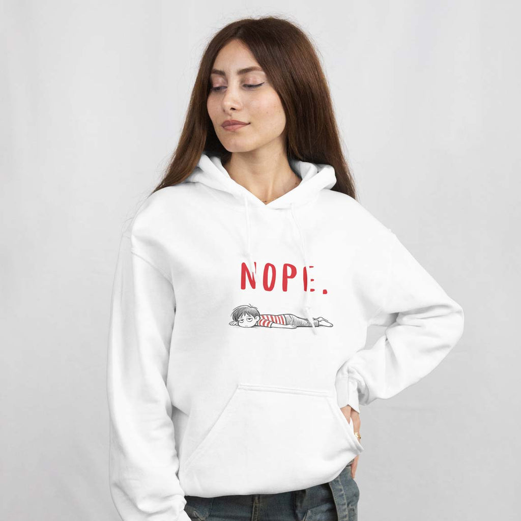 Woman wearing a white hoodie with a graphic design and text on a plain background