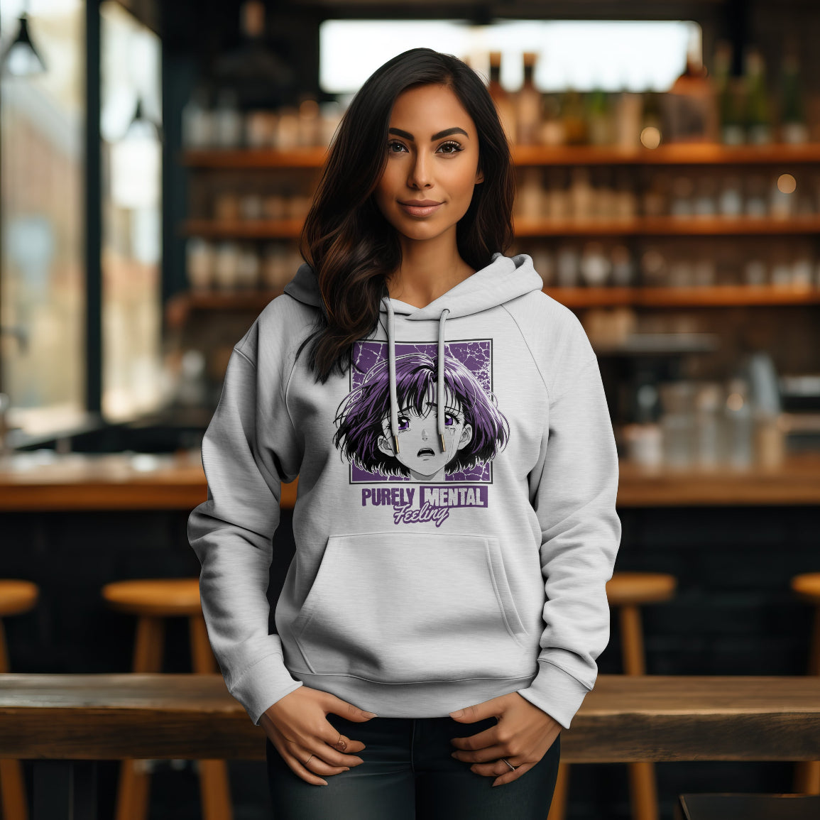 Woman wearing a hoodie with an anime character design in a bar setting