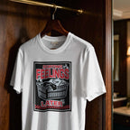 White t-shirt with graphic design hanging on a wooden hanger against a dark background