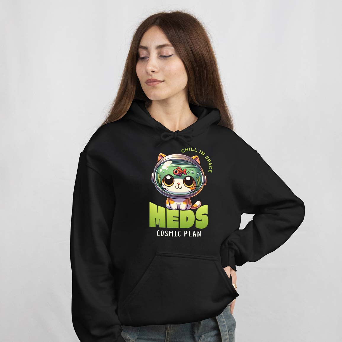 Person wearing a black hoodie with a graphic design on a plain background