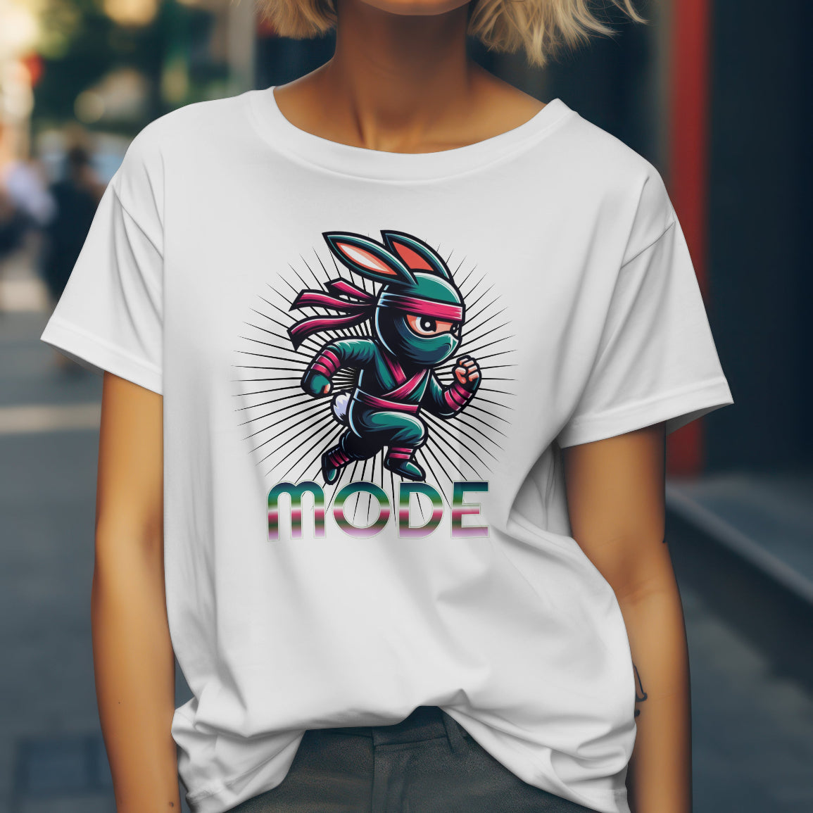 Person wearing a white t-shirt with a colorful graphic design and 'MODE' text.
