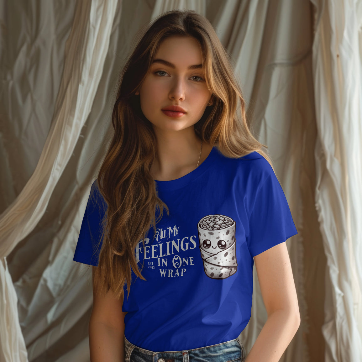 Woman wearing a blue t-shirt with a graphic design and text.