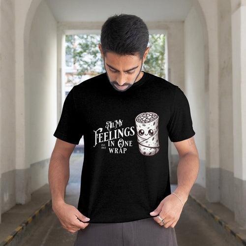 Man wearing a black t-shirt with a graphic design and text in an outdoor setting