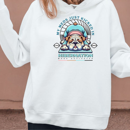 White hoodie with a cartoon bulldog design and text on a brown background