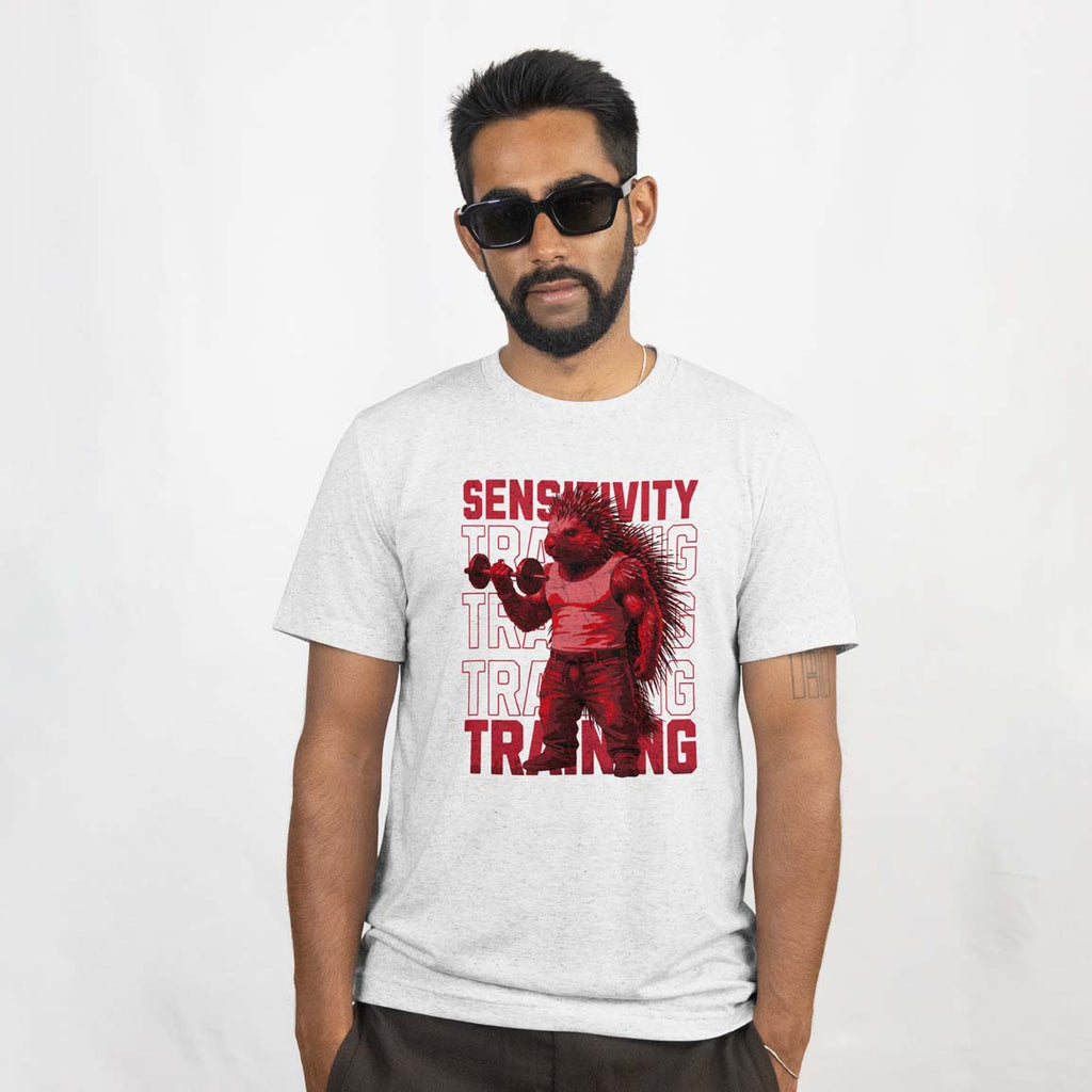 Man wearing a white t-shirt with a graphic design and text on a white background